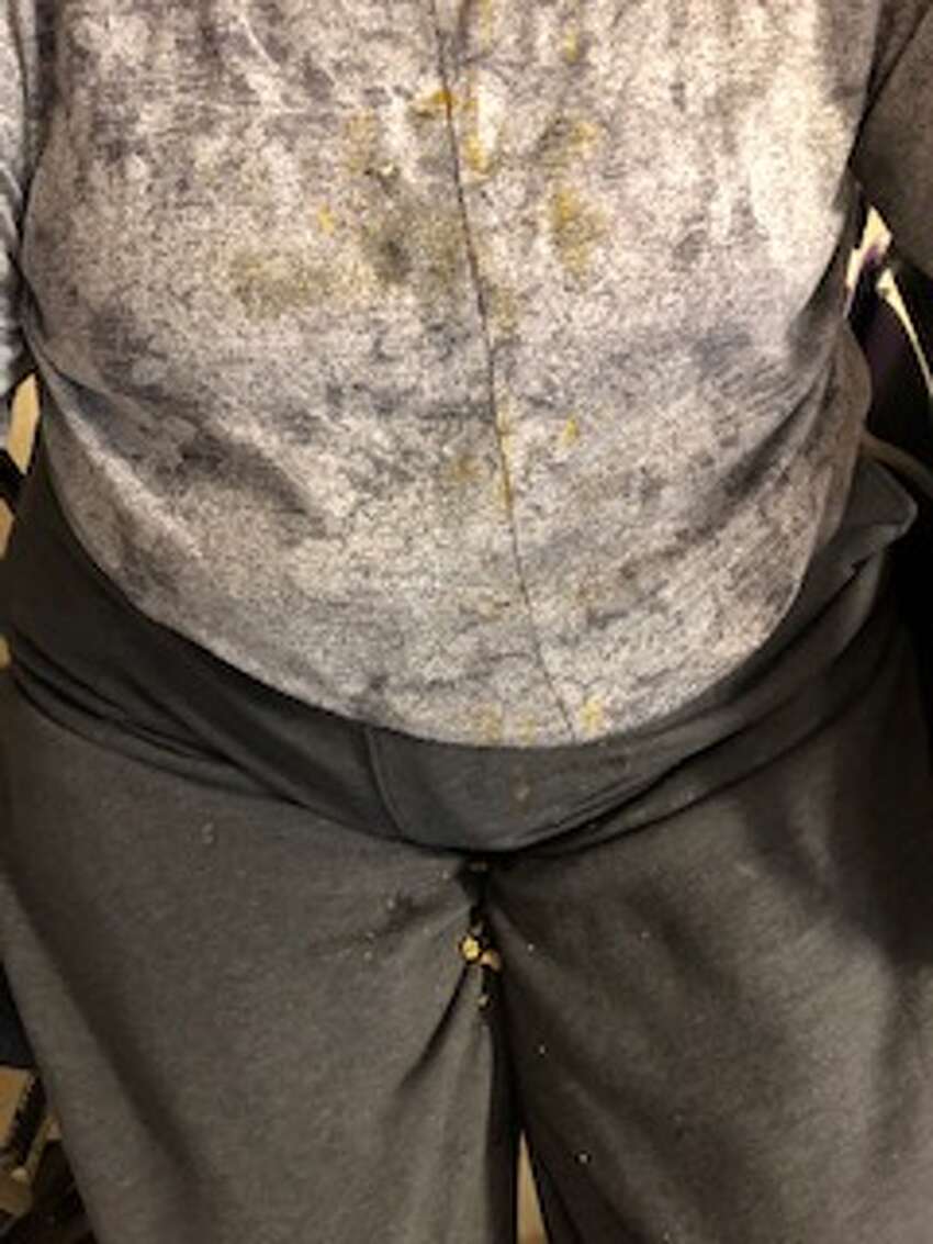 Mary Beth Delarm began documenting visits to her mother at the Diamond Hill nursing home in Schaghticoke last year. She believes her mother, who is in her 90s and has dementia, was being neglected based on the conditions she often found her in. In this photo, her clearly soiled shirt had been left unchanged.