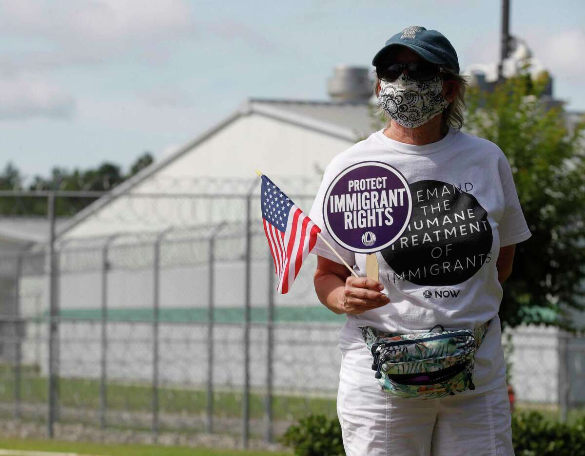 Immigrant rights activist Gina Biekman takes part in a vigil in front of the Joe Corley Detention Facility, Friday, May 29, 2020, in Conroe. Physicians with Doctors for America and immigrant rights activists began the 24-hour vigil to demand the release of detained asylum seekers, refugees, and nonviolent immigrants to prevent the spread of COVID-19. Texas is the state with most confirmed COVID-19 cases of immigrants confined in Immigration and Custom Enforcements’ detention centers, official counts indicate.