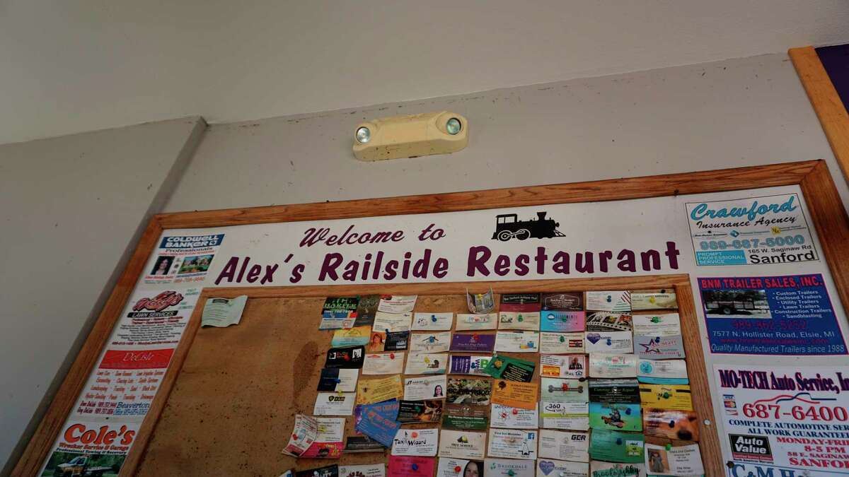 Sanford's Alex's Railside Restaurant employees feed local volunteers on