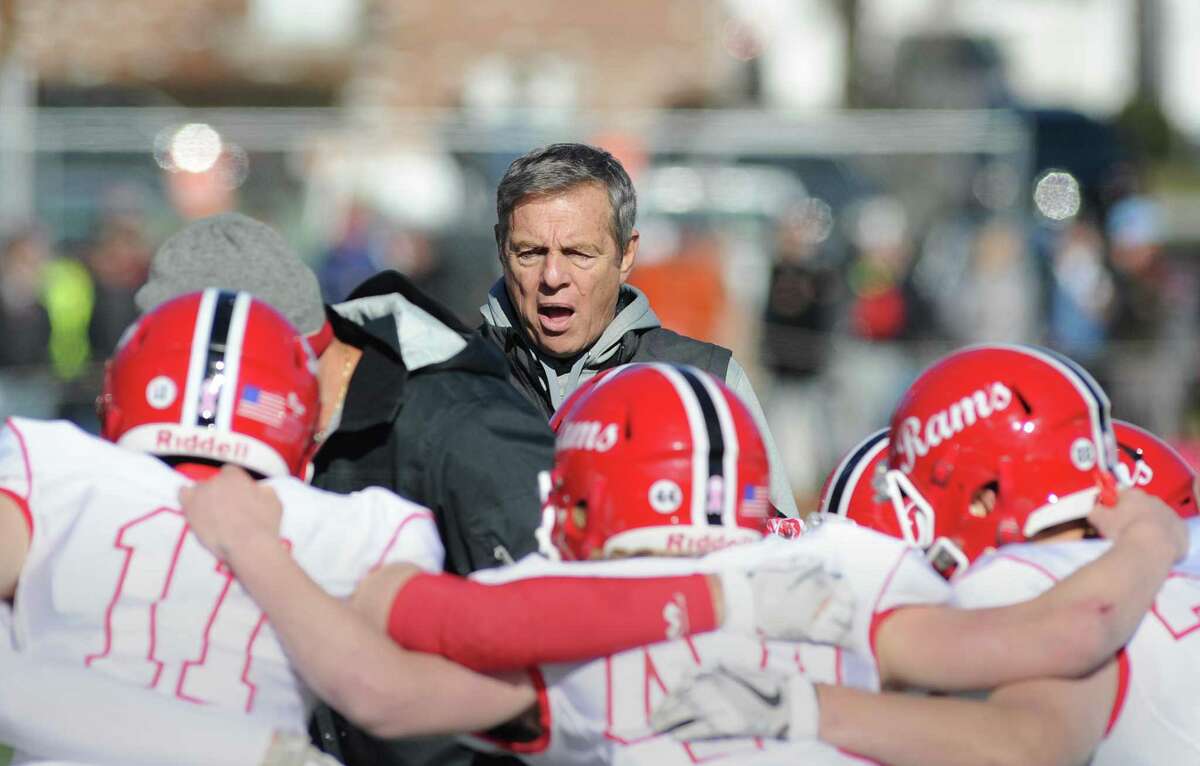 New Canaan football coach Lou Marinelli instructs his team during the 2017 Turkey Bowl game against Darien.