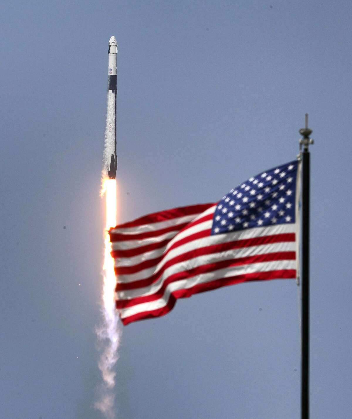 The SpaceX Falcon 9 rocket, carrying astronauts Doug Hurley and Bob Behnken in the Crew Dragon capsule, lifts off from Kennedy Space Center, Fla., on Saturday, May 30, 2020. The SpaceX Demo-2 mission is the first crewed launch of an orbital spaceflight from the U.S. in nearly a decade. (Joe Burbank/Orlando Sentinel/TNS)