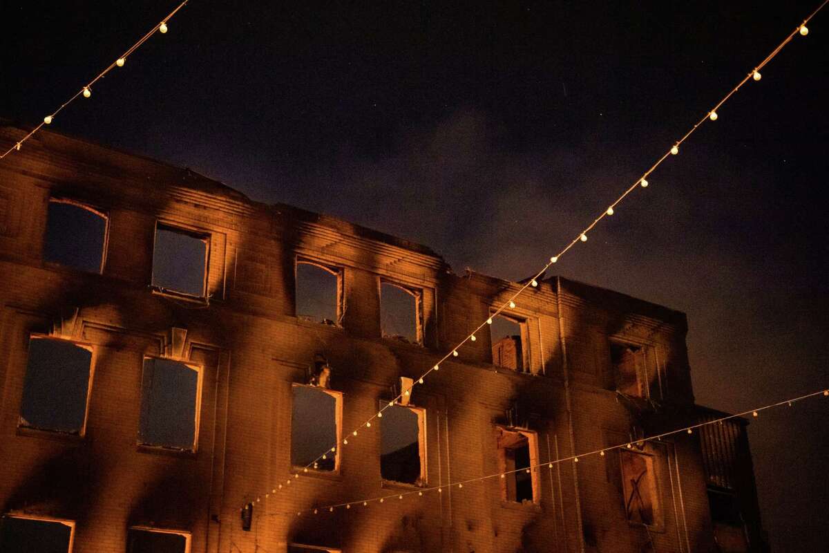 The husk of a burned-out building is seen along East Lake Street in Minneapolis, where protests were expected to continue for a fifth straight night after the death of George Floyd.