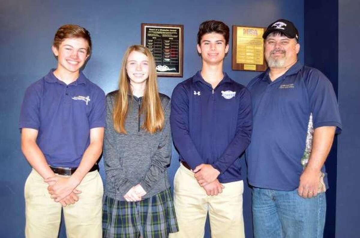 Father McGivney’s Austin Callovini, left, Natalie Raymer, center, and Blake Jones, along with coach Jeff Jones, represented FMCHS in the IHSA Bass Fishing State Final in 2019.