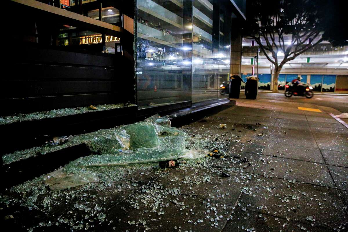 Executive Order Bar & Lounge is looted on Saturday in San Francisco. Protests in the Bay Area and the nation continued following the death of George Floyd, who died after being restrained by Minneapolis police officers on Memorial Day.