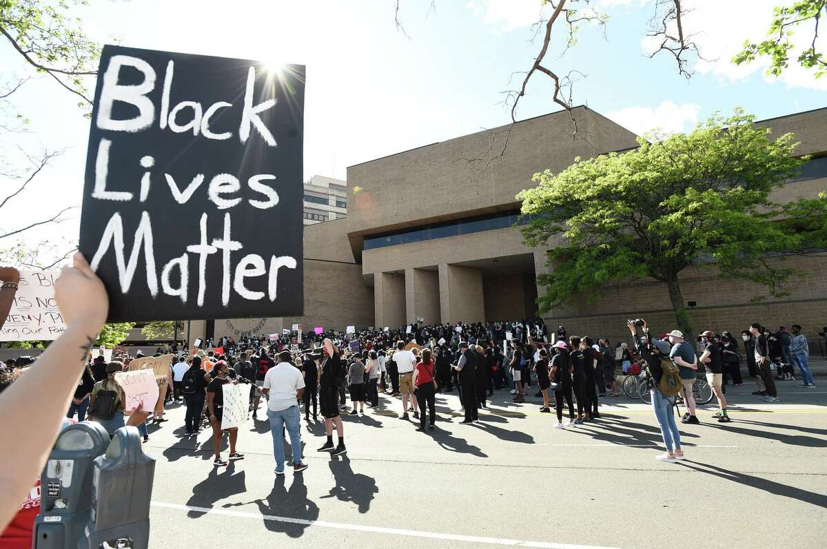 New Haven, Connecticut - Sunday, May 31, 2020: Approximately 1,000 Black Lives Matter protesters and supporters protesting police brutality and the death of George Floyd in Minneapolis Sunday, marched in New Haven Sunday from Broadway to the Green, past Church and blocking the I-95 and I-91 highways near the merge in New Haven in both directions, the Oak Street Connector and then on to New Haven Police Headquarters. As of 5:30 P.M. their were no police confrontations.