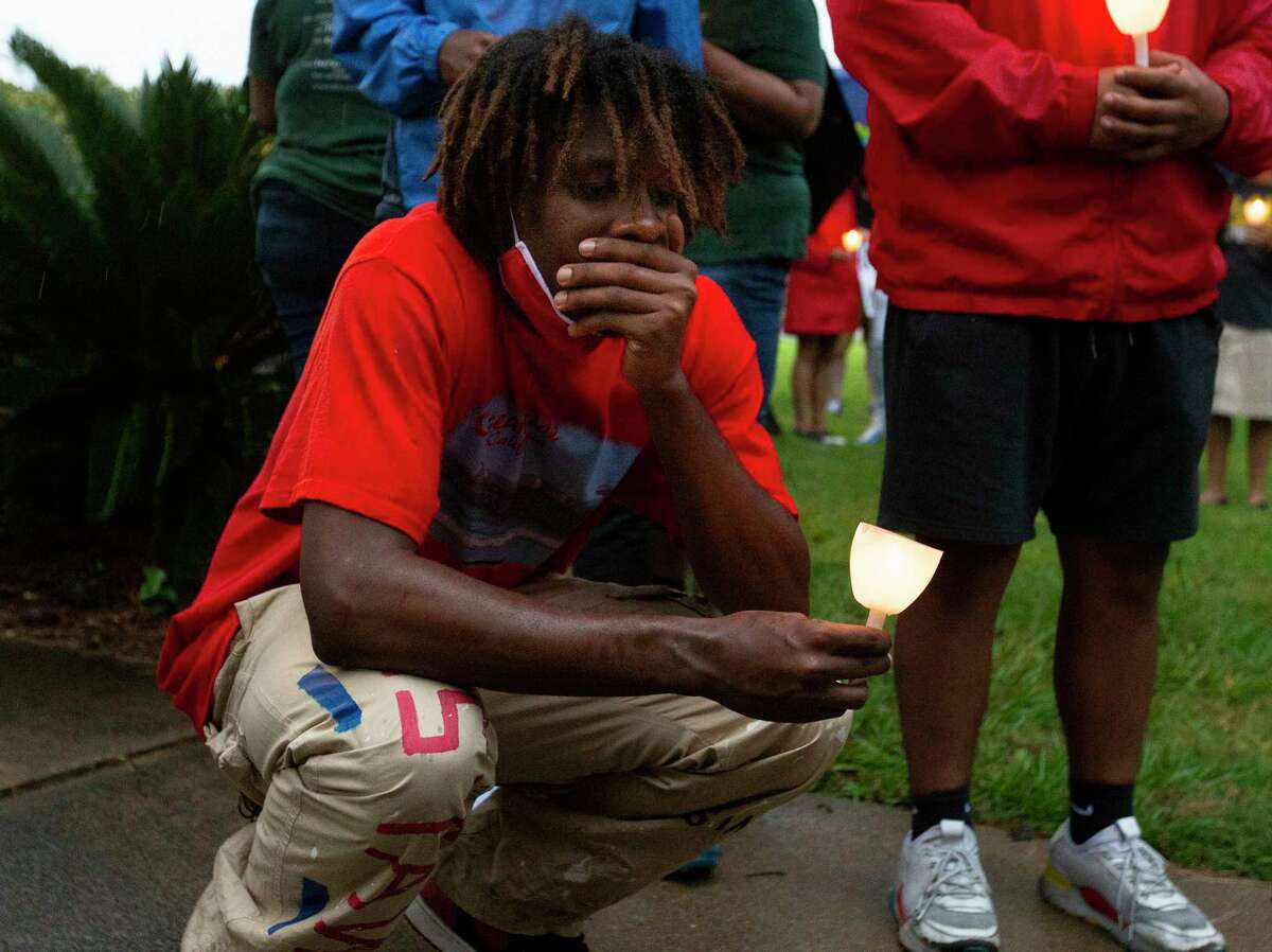 Timothy Freeny, of Richmond, takes a moment to reflect himself after a vigil for George Floyd, who died in Minneapolis Police Department custody earlier this week, Sunday, May 31, 2020, at Metropolitan Community Church in Houston. The vigil held an eight-minute-and-46-seconds moment of silence, the time that white MPD officer, Derek Chauvin, kept his knee on Floyd's neck, to remember Floyd.