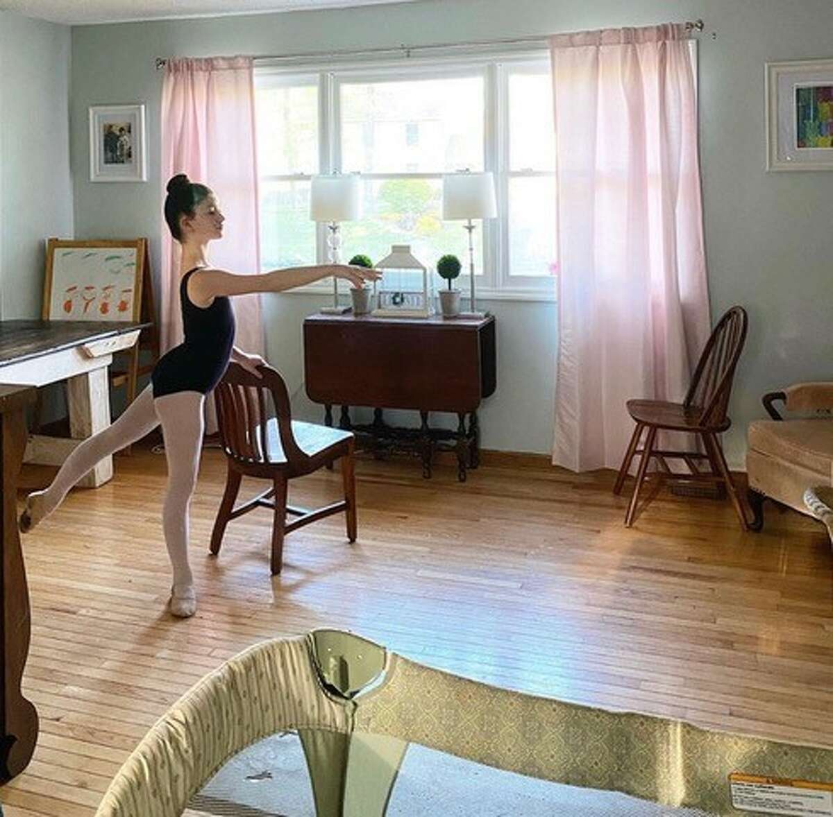 Leven O’Keefe practices in her family's dining room in Schenectady.