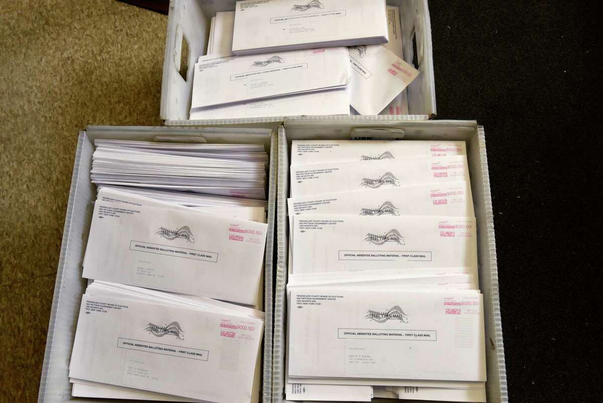 Absentee ballots are seen in bins as Rensselaer County Board of Elections handles thousands of absentee ballots for June 23 primary on Monday, June 1, 2020 in Troy, N.Y. (Lori Van Buren/Times Union)