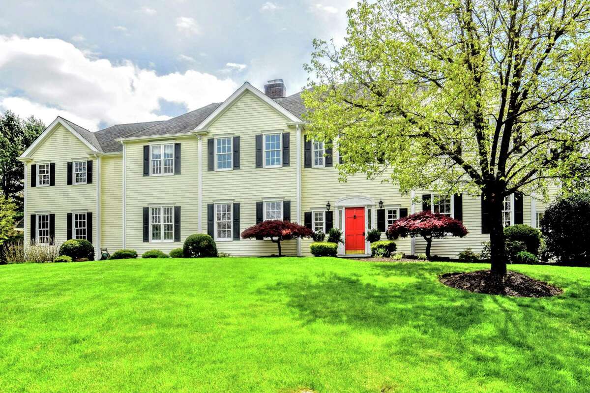 On the Market Classic Colonial in Weston features privacy, convenience