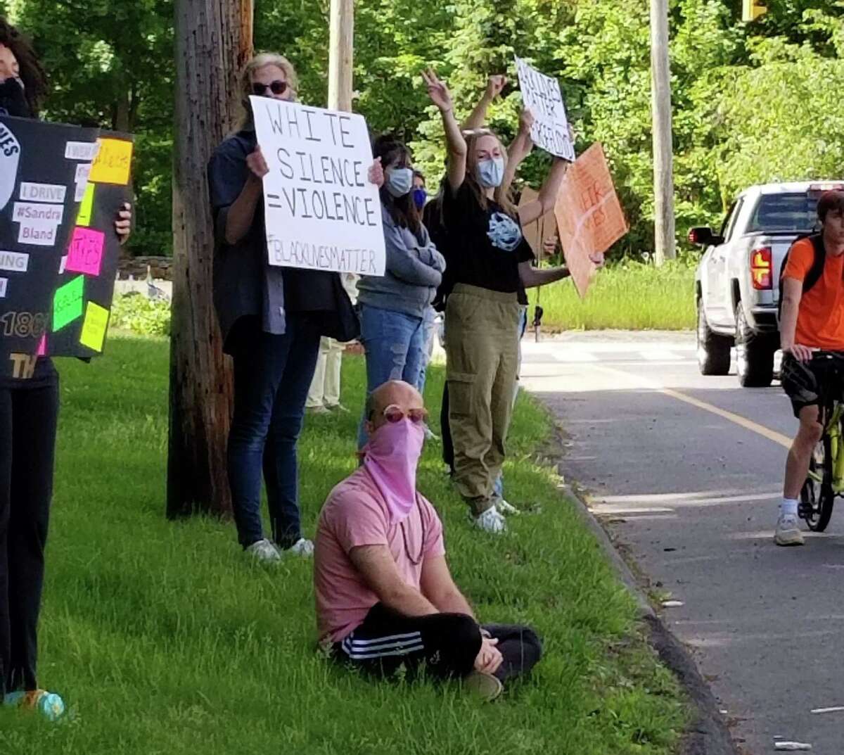 Protesters lied the side of Huntington Green on Sunday. The people were joining in what has become a country-wide protest of Minneapolis man George Floyd's death while in police custody last week.