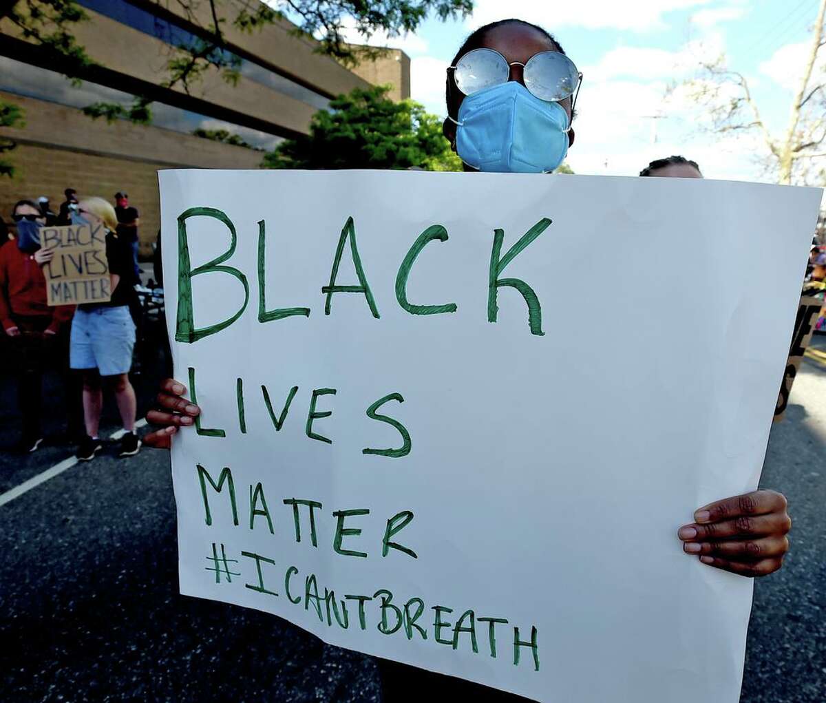 New Haven, Connecticut - Sunday, May 31, 2020: Approximately 1,000 Black Lives Matter protesters and supporters protesting police brutality and the death of George Floyd in Minneapolis S'unday, marched in New Haven Sunday from Broadway to the Green, past Church and blocking the I-95 Highway in New Haven in both directions and then on to New Haven Police Headquarters protesting police brutality and the death of George Floyd in Minneapolis. As of 5:30 P.M. their were no police confrontations.