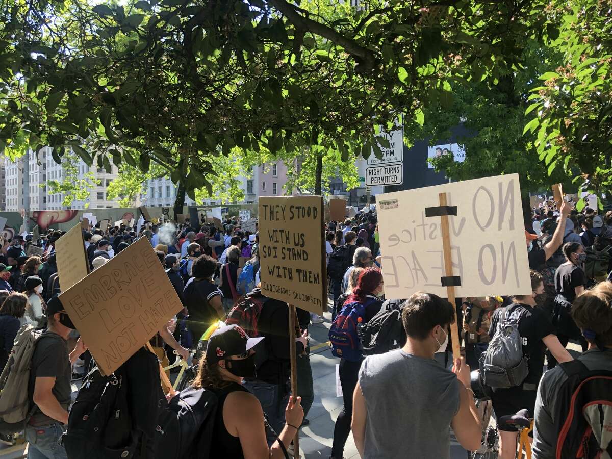 Protesters march against police brutality in downtown Seattle, June 1, 2020.