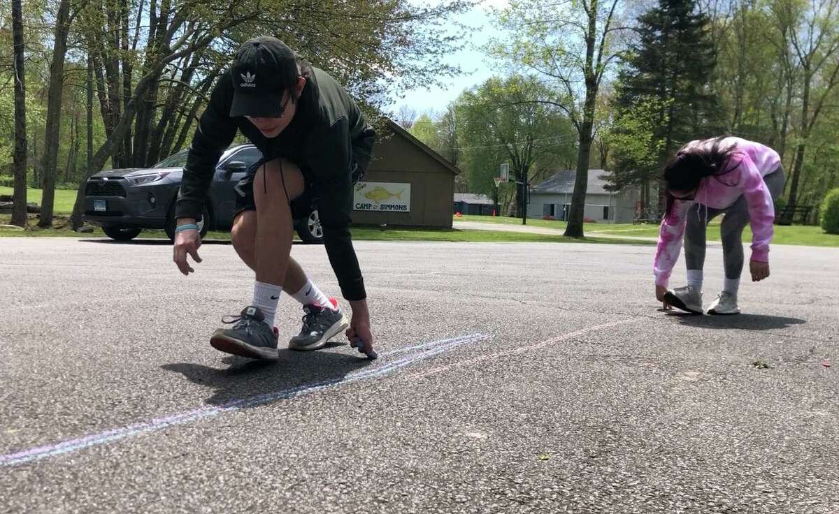 On Friday, kids in Greenwich will be invited to take 'A Walk with Chalk' and draw lines as they head to friends’ houses, walk to their schools or stop off at the Greenwich Boys & Girls Club, where they can pause to create artwork in the parking lot, along sidewalks and on the “main canvas” of the club’s semicircular driveway.