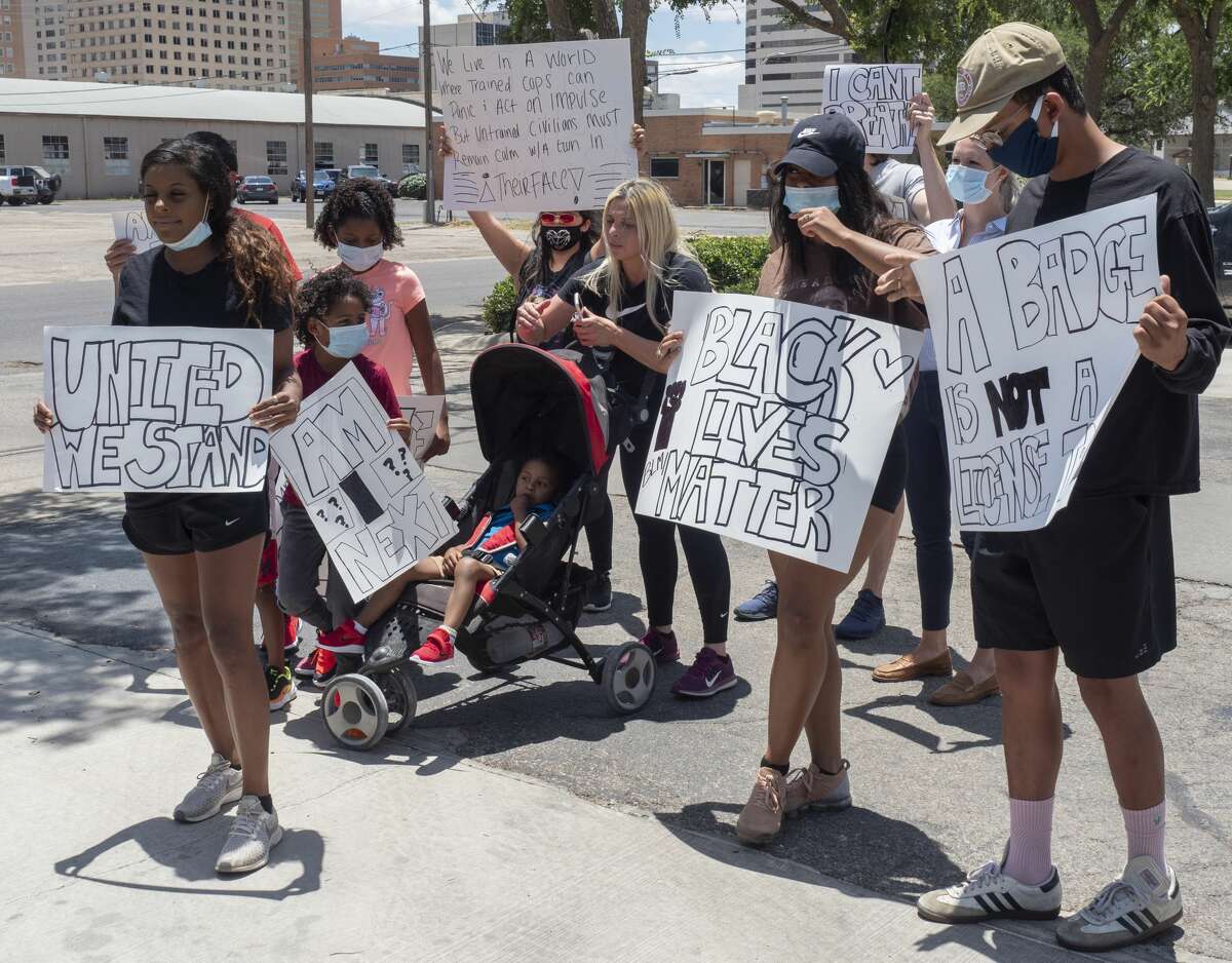 Latriceia Smith, front left, organized a protest march 06/02/2020 afternoon, starting at the Midland County Courthouse and marching through downtown Midland. Tim Fischer/Reporter-Telegram