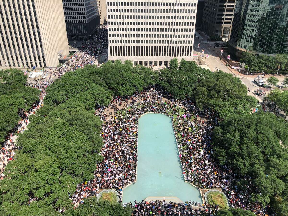 A view from the top of city hall as people join George Floyd’s family in a march on Tuesday, June 2, 2020, from Discovery Green to City Hall in downtown Houston.
