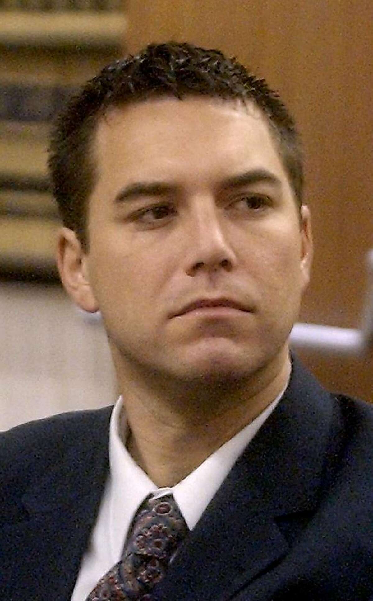 Scott Peterson is shown in this Sept. 2, 2003 photo. Peterson will stand trial on two counts of murder for the death of his wife, Laci Peterson, and her unborn son, charges that could bring the death penalty, a judge in Modesto, Calif., ruled Tuesday, Nov.18, 2003. (AP Photo/Pool, Al Golub)