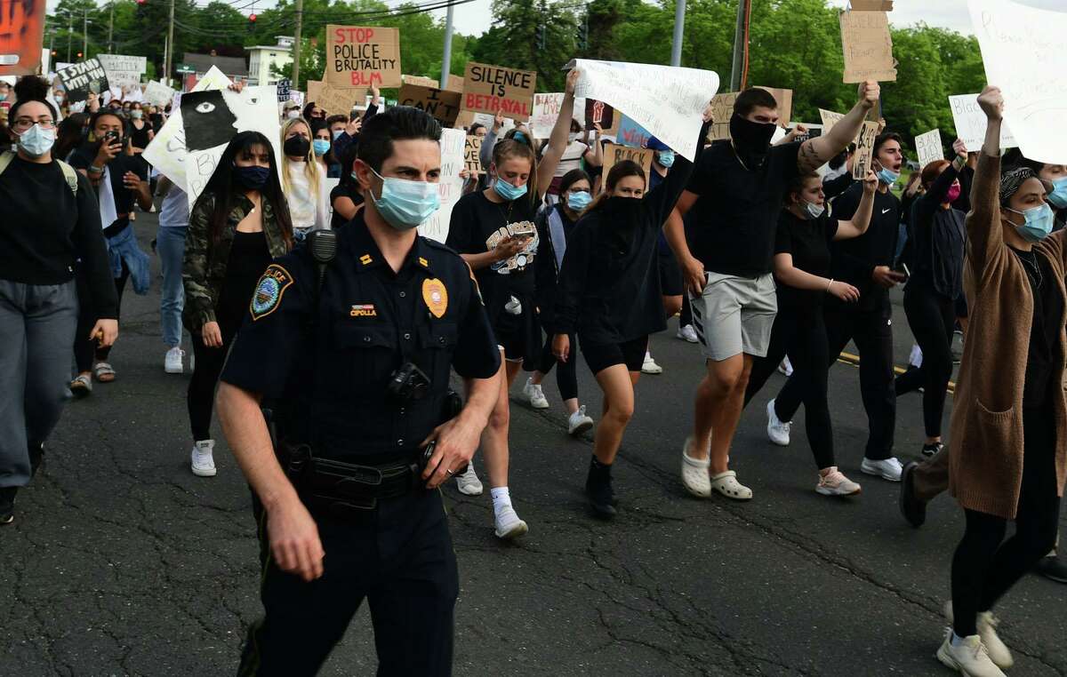 Police Capt. Rob Cipolla was among a number of Wilton officers escorting a crowd of nearly 200 along Route 7 as they marched to protest police brutality on June 2.