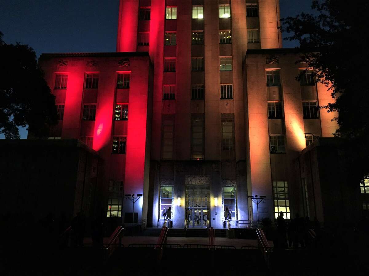City Hall is glowing with crimson and gold lights. Photo: St. John Barned-Smith