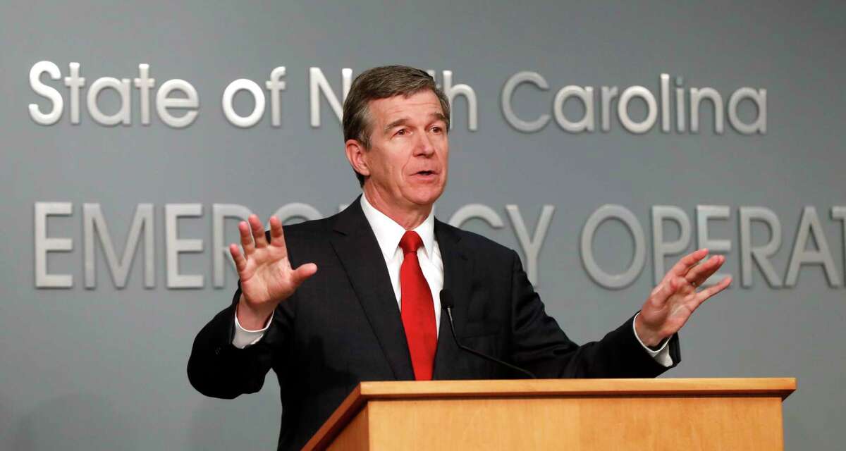 North Carolina Gov. Roy Cooper speaks during a briefing at the Emergency Operations Center in Raleigh, N.C., Tuesday, June 2, 2020. (Ethan Hyman/The News & Observer via AP)