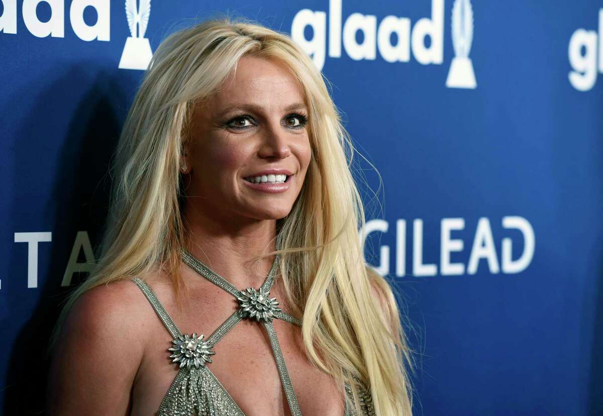 This April 12, 2018 file photo shows Britney Spears at the 29th annual GLAAD Media Awards in Beverly Hills, Calif. Although she's been under a conservatorship in California since 2008, she has still been able to continue with her career as a pop star. Chris Pizzello/Invision/AP, File)