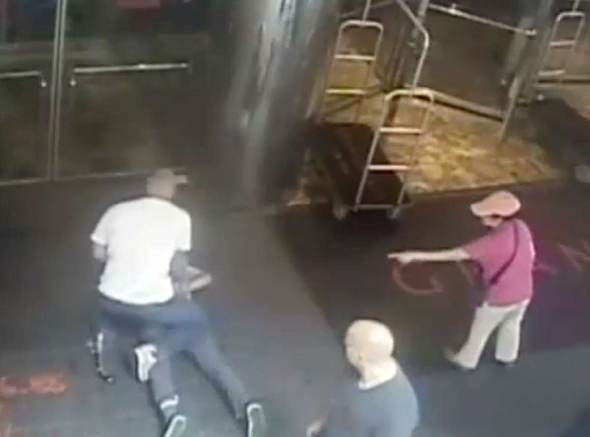 This image taken from a surveillance camera and released by the New York Police Department shows former tennis star James Blake, on ground, being arrested by plainclothes officer James Frascatore outside of the Grand Hyatt New York hotel on Wednesday, Sept. 9, 2015, in New York. Blake was mistaken for an identity-theft suspect that Police Commissioner William Bratton said looked like Blake's "twin." Bratton apologized to Blake. (NYPD via AP)