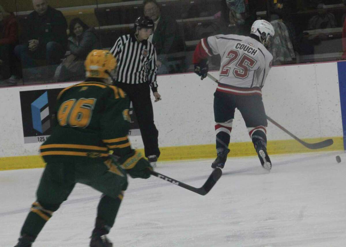 Big Rapids' Ian Couch (25) goes after the puck during action this season. (Pioneer file photo)
