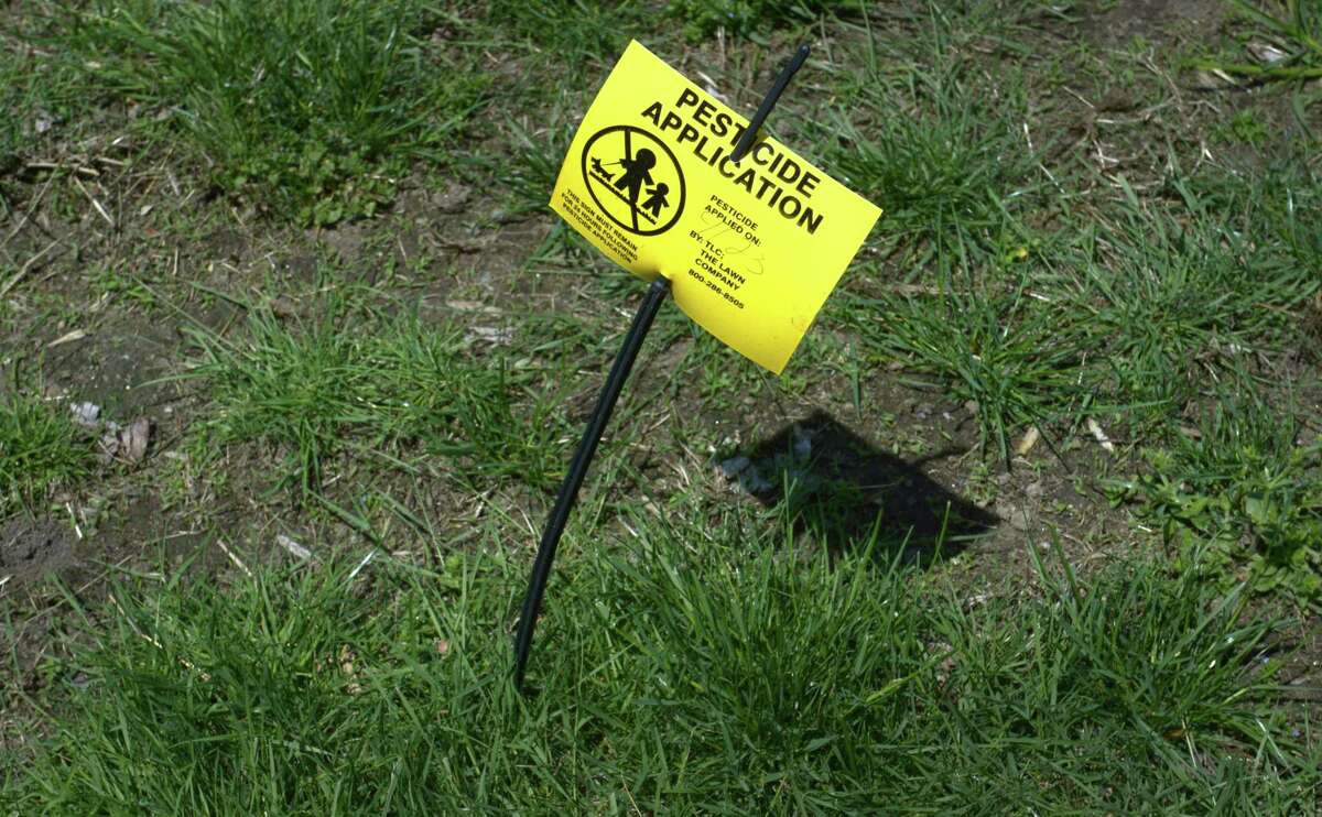 A pesticide warning sign in Norwalk.