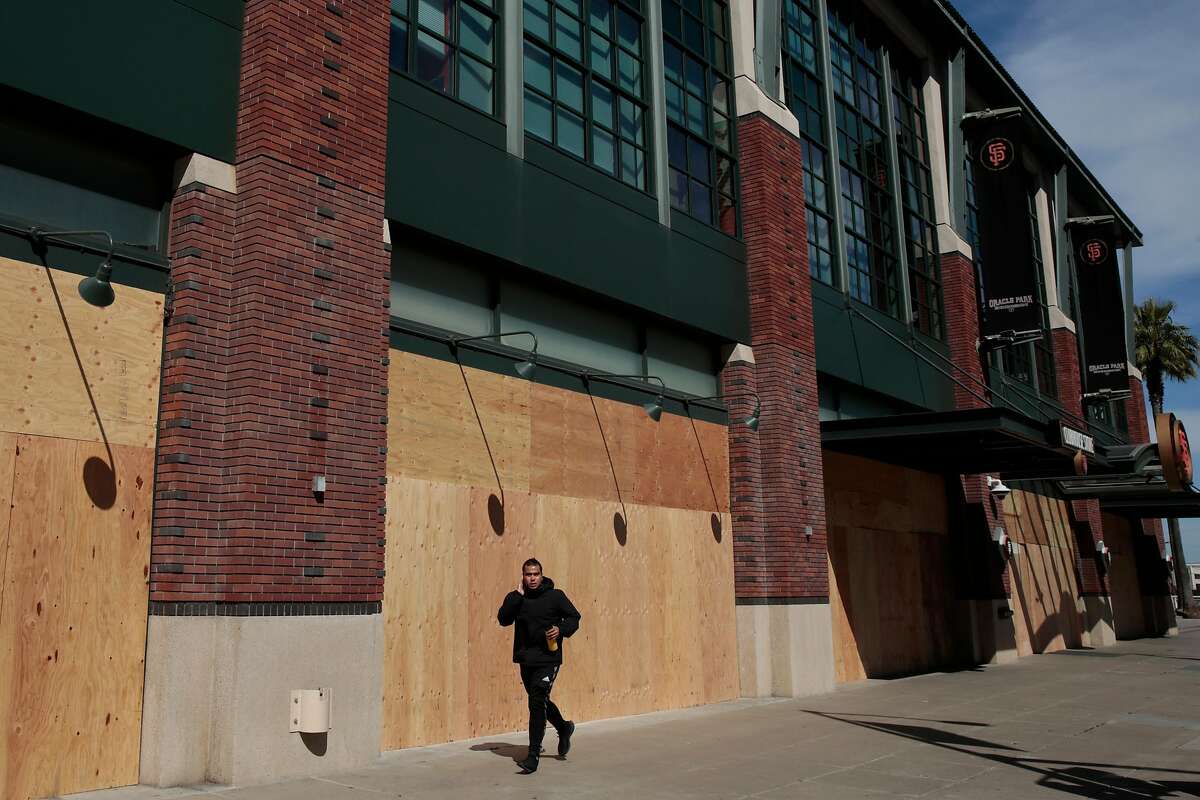 The boarded up Oracle Park on Tuesday, June 2, 2020, in San Francisco, Calif. The park hosts home games for the San Francisco Giants. Peaceful protests, riots, vandalism and looting in the Bay Area and the nation continued following the death of George Floyd, who died after being restrained by Minneapolis police officers on Memorial Day. Minneapolis police officer Derek Chauvin is charged with third-degree murder and second-degree manslaughter for the death of Floyd. Businesses have boarded up their storefronts in an attempt to prevent looting and vandalism.