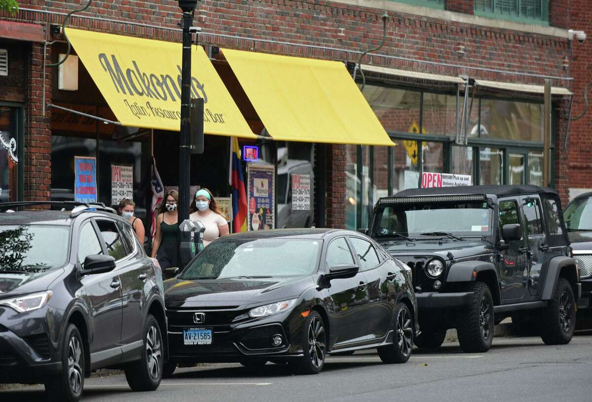 Cars parked along North Main Street Wednesday June 3, 2020, in Norwalk, Conn.