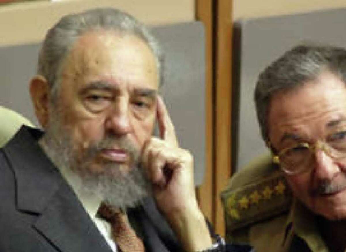 Cuban President Fidel Castro (left) and his brother, Raul Castro: A reader says tourism in Cuba will only provide dollars to the brothers.