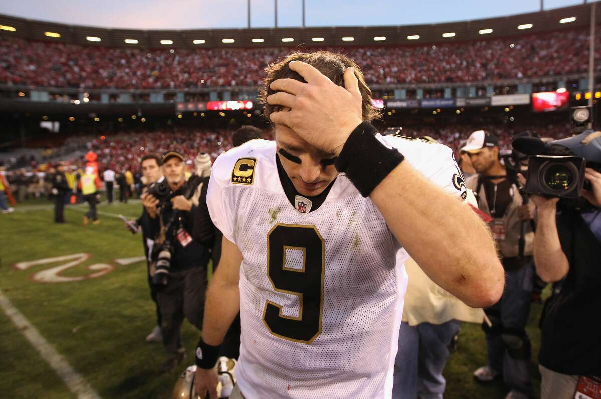 SAN FRANCISCO, CA - JANUARY 14: Drew Brees #9 of the New Orleans Saints reacts after they lost their game against the the San Francisco 49ers in the NFC Divisional playoff game at Candlestick Park on January 14, 2012 in San Francisco, California. (Photo by Ezra Shaw/Getty Images)