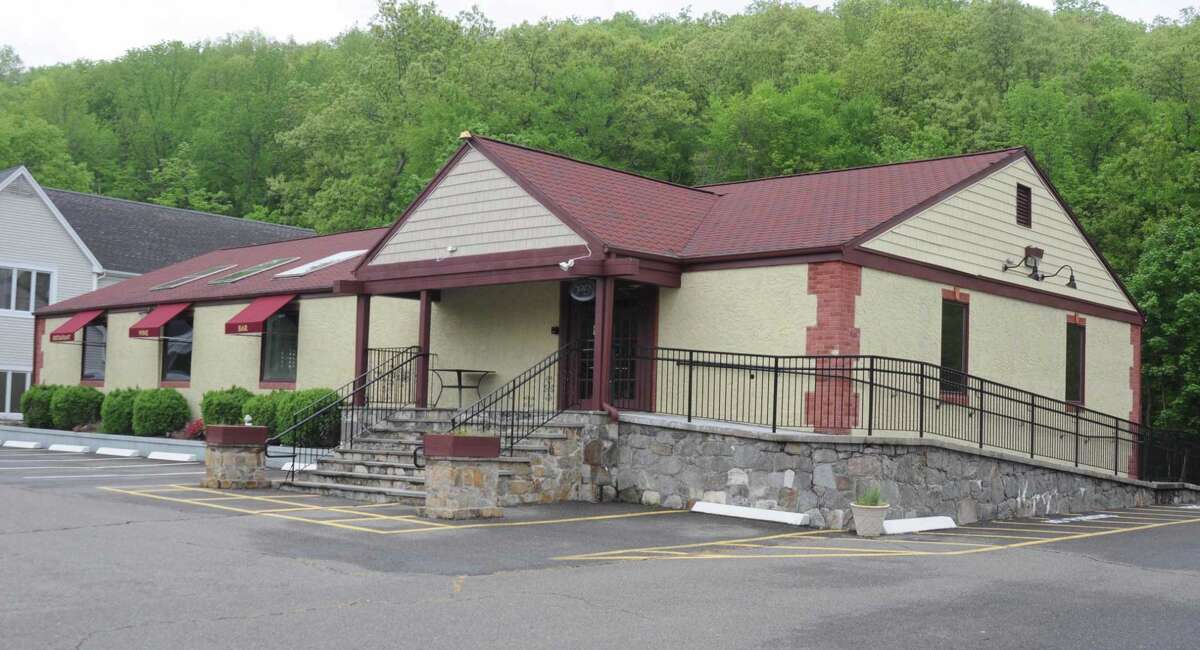 After a long series of restaurants — Spanish, Asian, American — have come and gone, this Route 7 building is now being proposed for drive-through food service, to be located in the back.