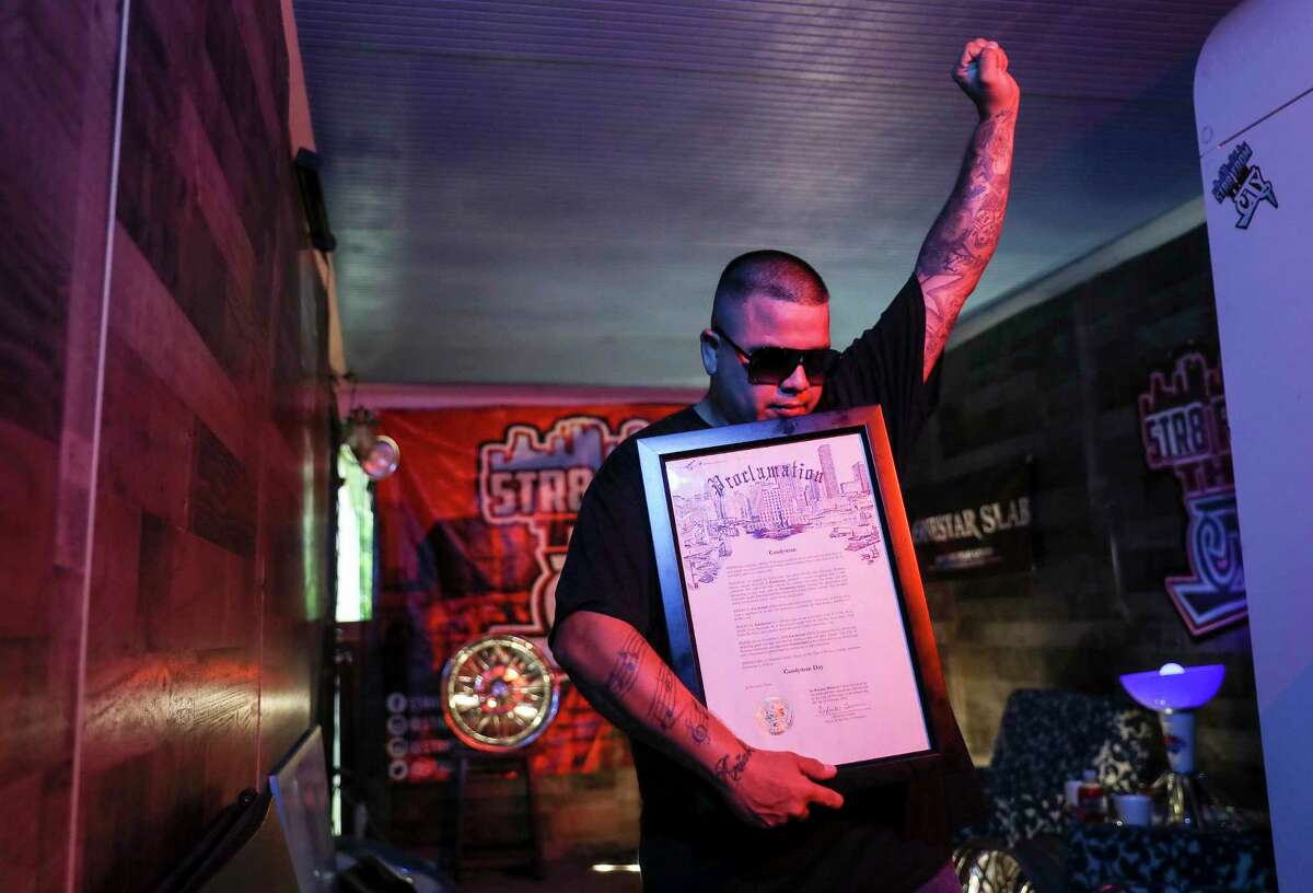 Domingo Herrera, who goes by CANDYMAN, poses with proclamation he previously received from the City of Houston during a portrait session Wednesday, June 3, 2020, at his home in Houston. Herrera was arrested Friday, May 29 while protesting in downtown Houston.