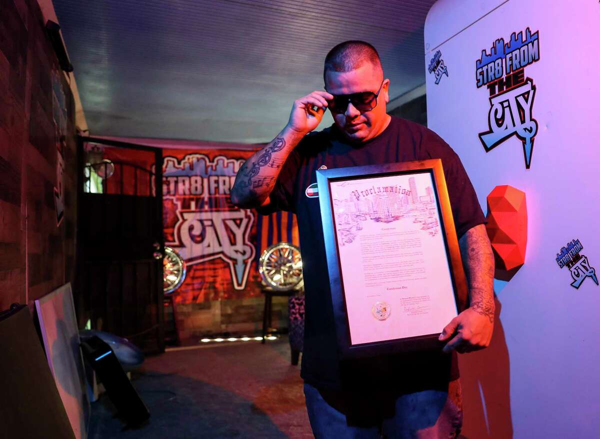 Domingo Herrera, who goes by CANDYMAN, holds a proclamation he previously received from the City of Houston during a portrait session Wednesday, June 3, 2020, at his home in Houston. Herrera was arrested Friday, May 29 while protesting in downtown Houston.