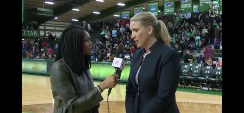 Isis Young interviews Siena coach Ali Jaques during a game last season. (Courtesy of Siena College Athletics)