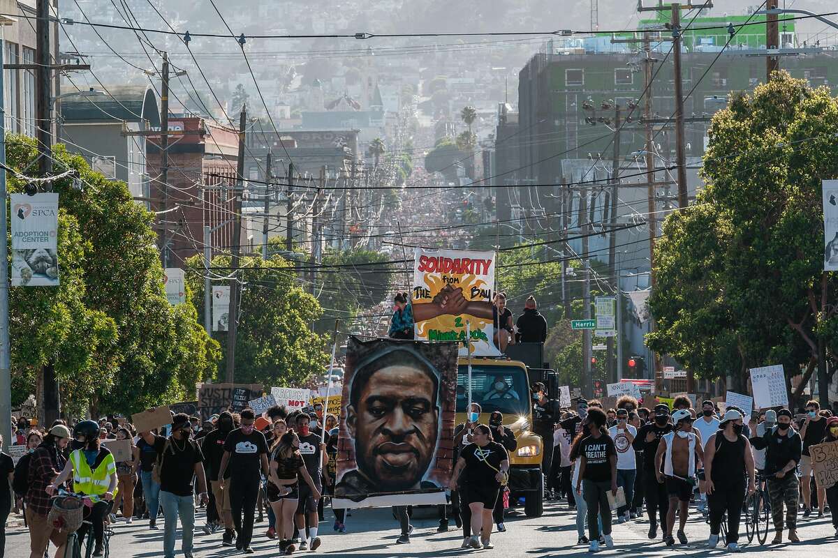 People march in a student led George Floyd protest in San Francisco on Wednesday, June 3, 2020.