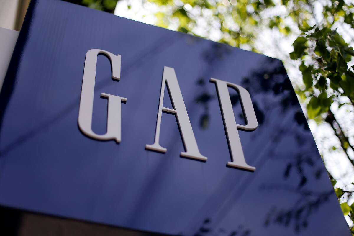 This photo taken on May 14, 2014, shows signage outside a Gap store in the Shadyside section of Pittsburgh. The Gap Inc. reports quarterly financial results after the market closes Thursday, May 21, 2015. (AP Photo/Gene J. Puskar)