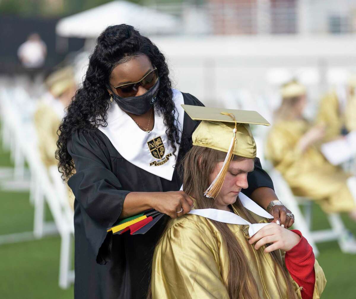 Conroe High grads leave difficult year behind at school’s 118th ceremony