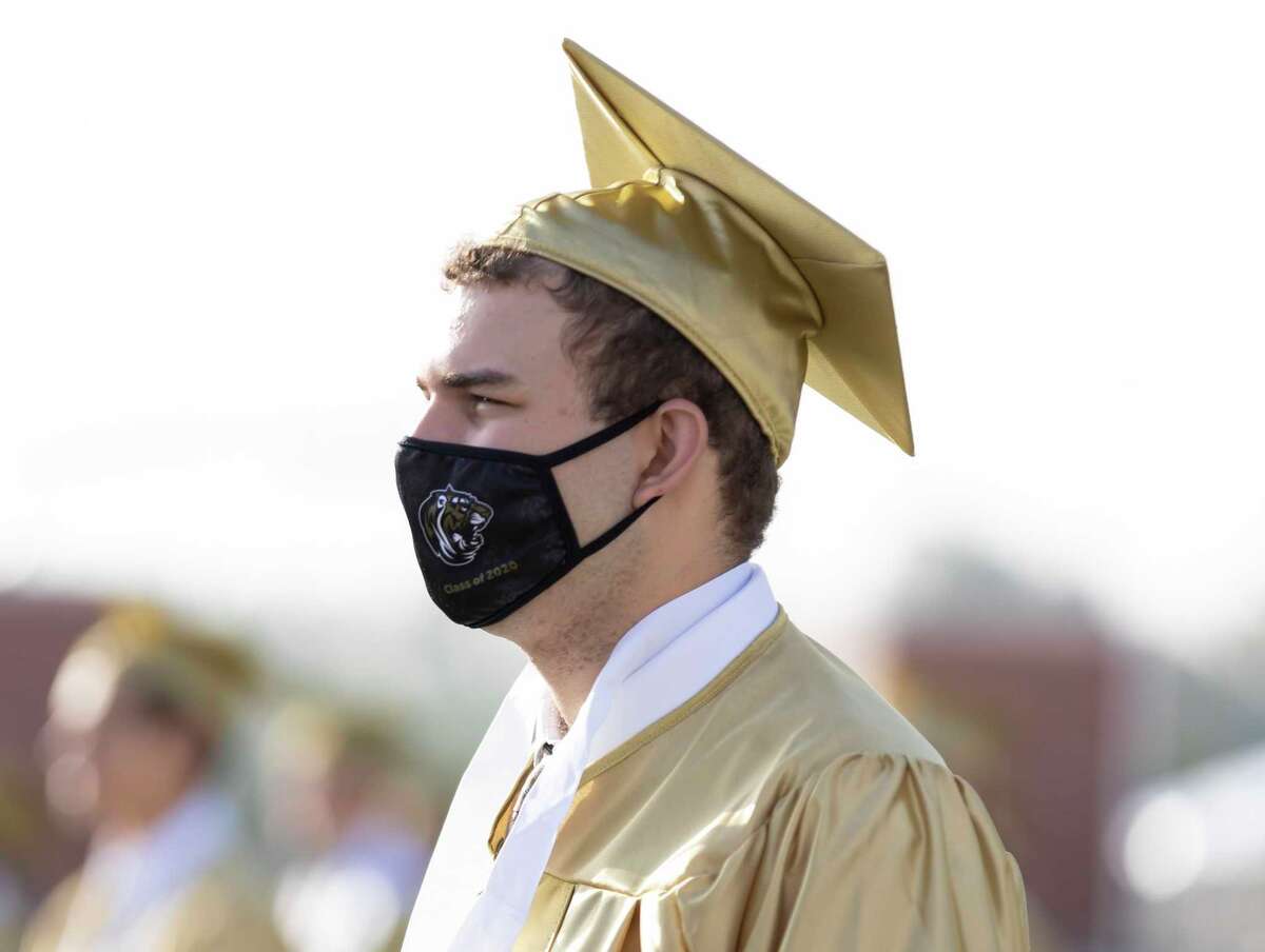 Conroe High grads leave difficult year behind at school’s 118th ceremony