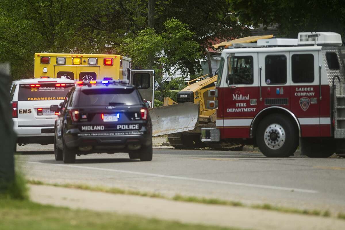 Midland Police investigate a fatal accident Thursday afternoon, June 4, 2020 at the intersection of Eastlawn Drive and Cleveland Avenue near the construction site at Eastlawn Elementary School. (Katy Kildee/kkildee@mdn.net)