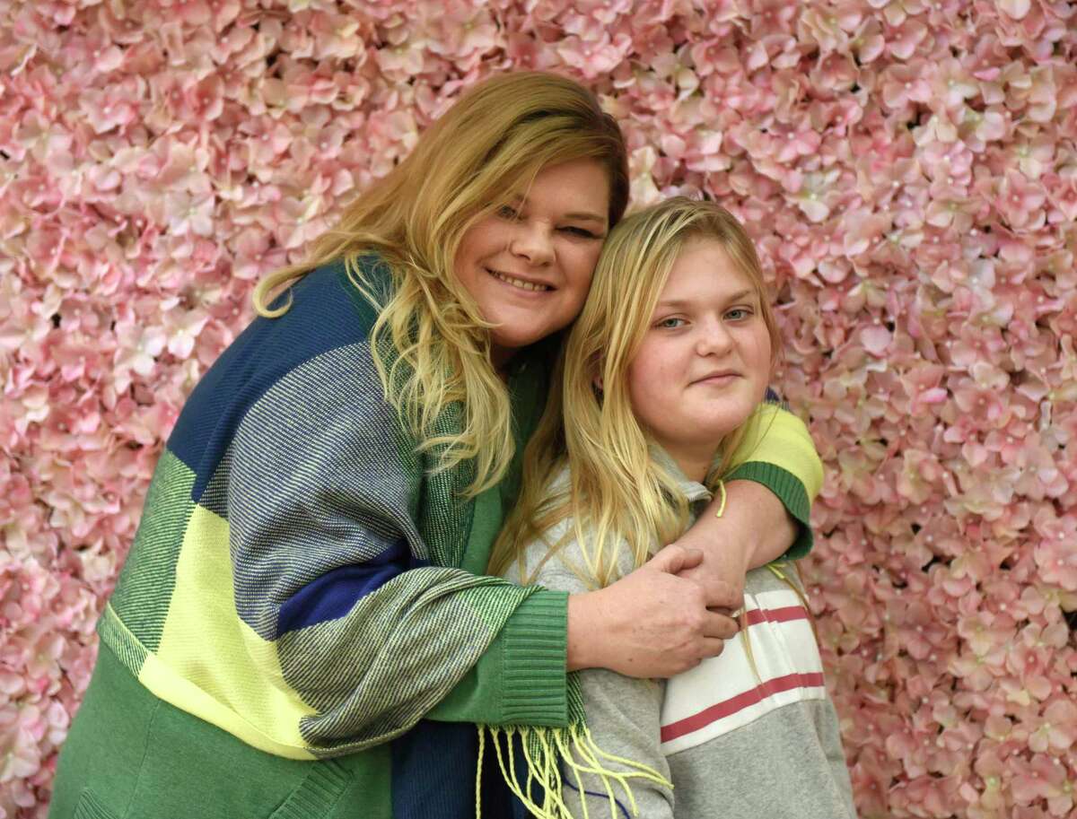 Christine Dodaj poses with her daughter, Brooke, at J House in the Riverside section of Greenwich, Conn. Sunday, Jan. 5, 2020. Brooke has been a victim of bullying in Greenwich Public Schools for many years because of her special needs.