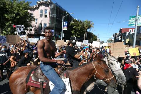 SF protest in the Mission District had an uplifting sight — two horses