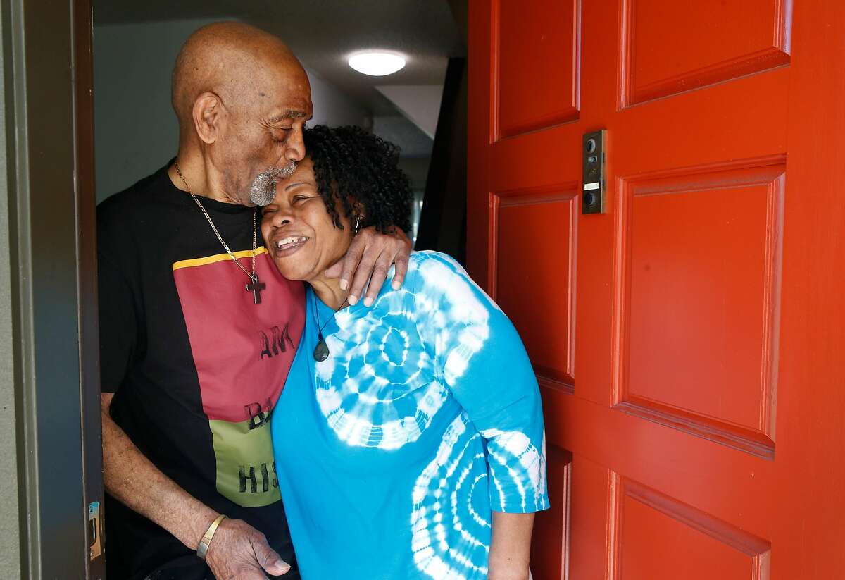 Ernest and Linda Hills stand in the doorway of their home in San Francisco, Calif. on Thursday, June 4, 2020. Ernest Hills uses the programs provided at the Bayview Hunters Point Adult Day Health Center but proposed cuts in the state budget could force the center to shut down.