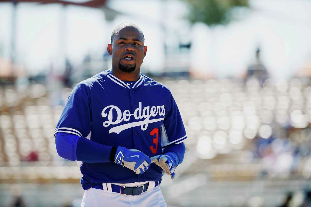 Fan who allegedly yelled racial slur at Carl Crawford is a police