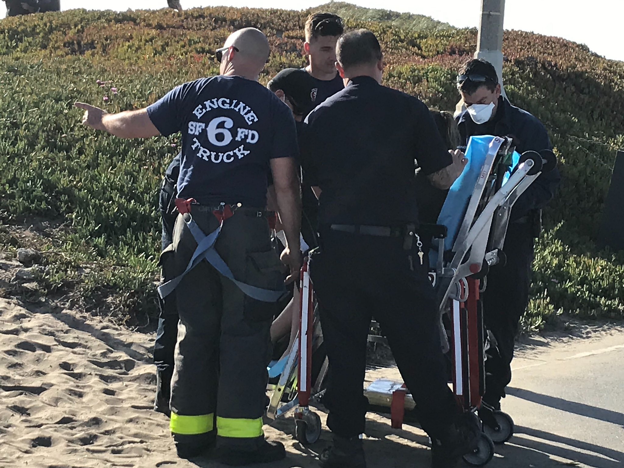 Rescuers pull two swimmers out of Ocean Beach surf, one man in critical ...