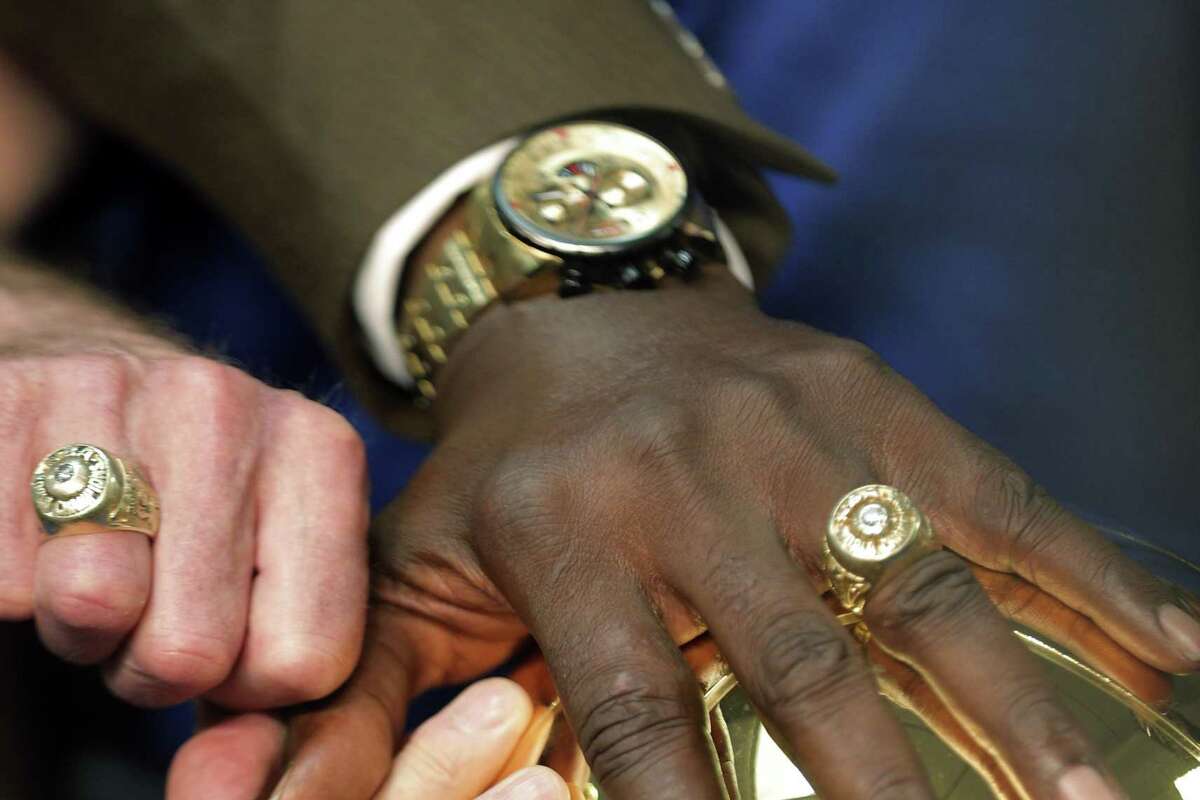 The championship rings of members of the 1975 Warriors team.