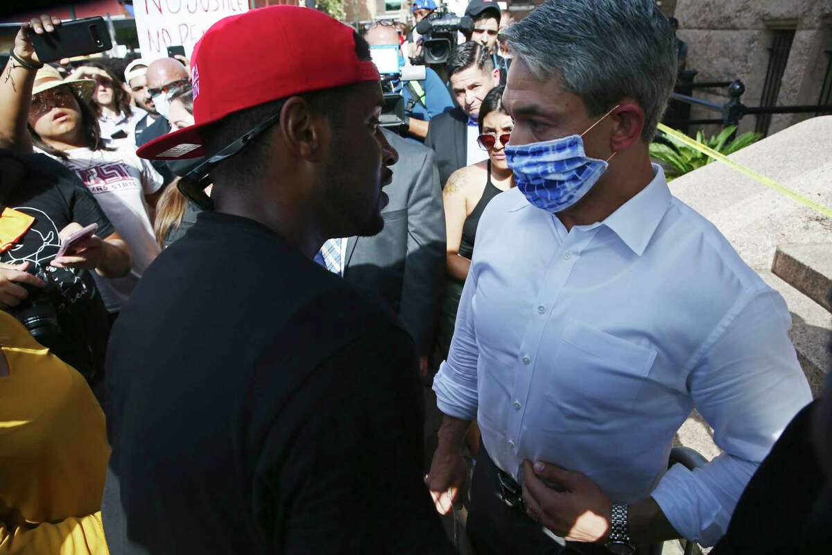 San Antonio Mayor Ron Nirenberg speaks to Roger Mortensen after addressing protesters gathered in front of the Bexar County Courthouse, Thursday, June 4, 2020. It is the sixth of protest in the police killing of George Floyd on Memorial Day in Minneapolis.