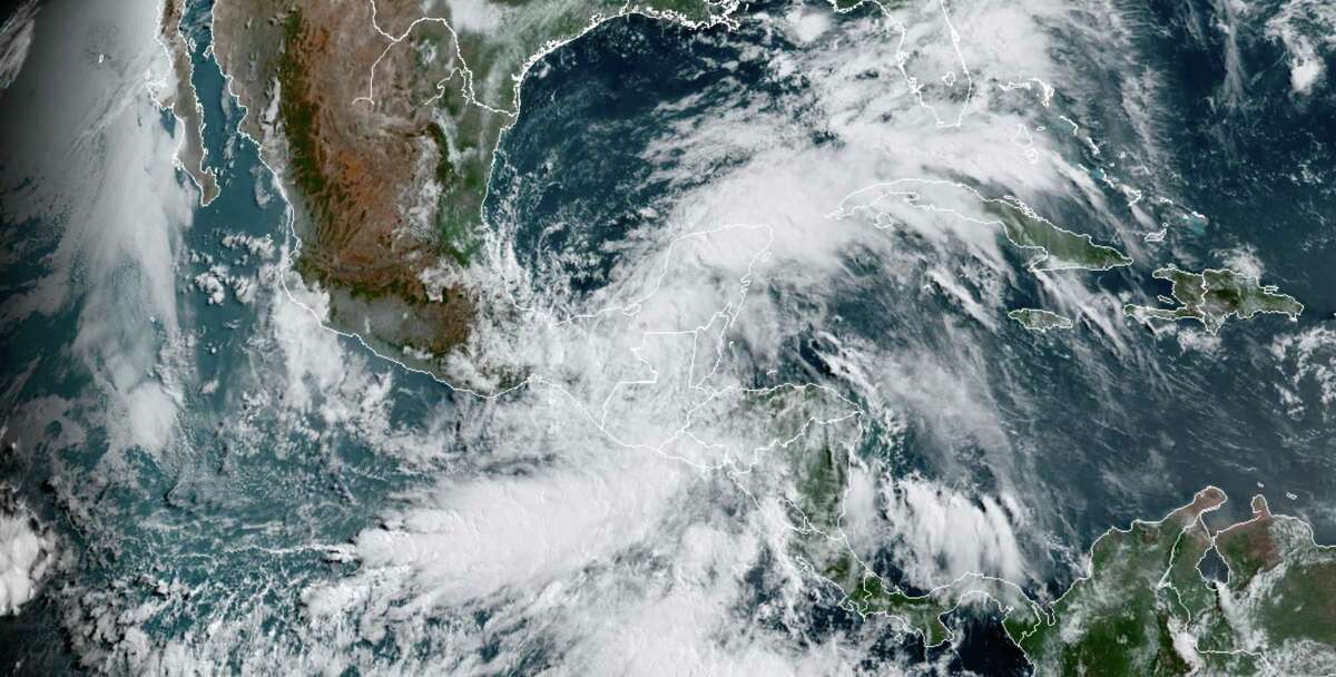Satellite imagery shows swirling clouds approaching the Gulf of Mexico on Thursday, June 4, 2020. MUST CREDIT: NOAA