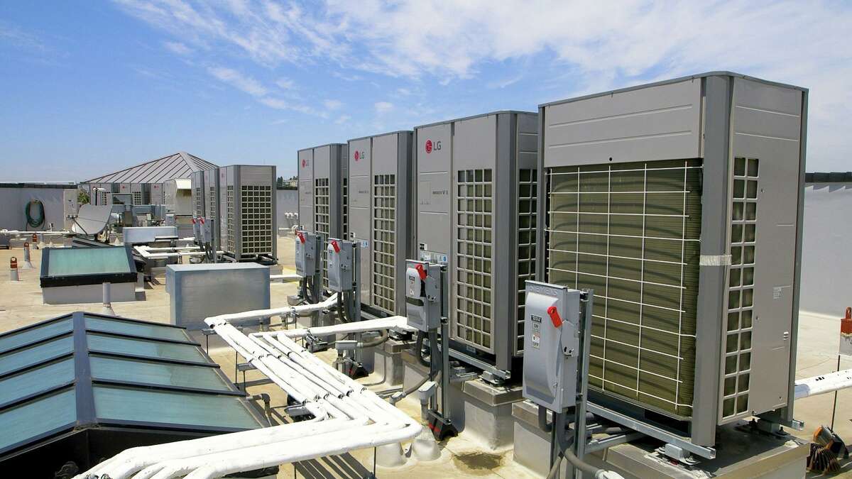 Rooftop air-exchange units part of the Multi V heating system sold by LG Air Conditioning Technologies, in a 2019 file photo. Demand for heating, ventiliation and air conditioning retrofits is on the rise in 2020 as building managers increase air filtration, ionization and ventilation to limit any transmission of coronavirus in their HVAC systems.