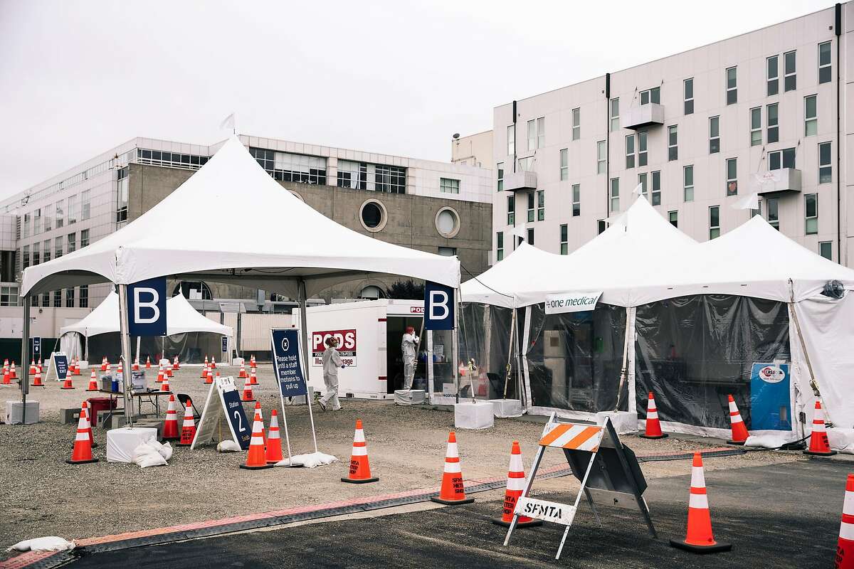 Medical workers are seen at CityTestSF Soma a COVID-19 coronavirus testing site in San Francisco, Calif. on Friday, June 5, 2020.
